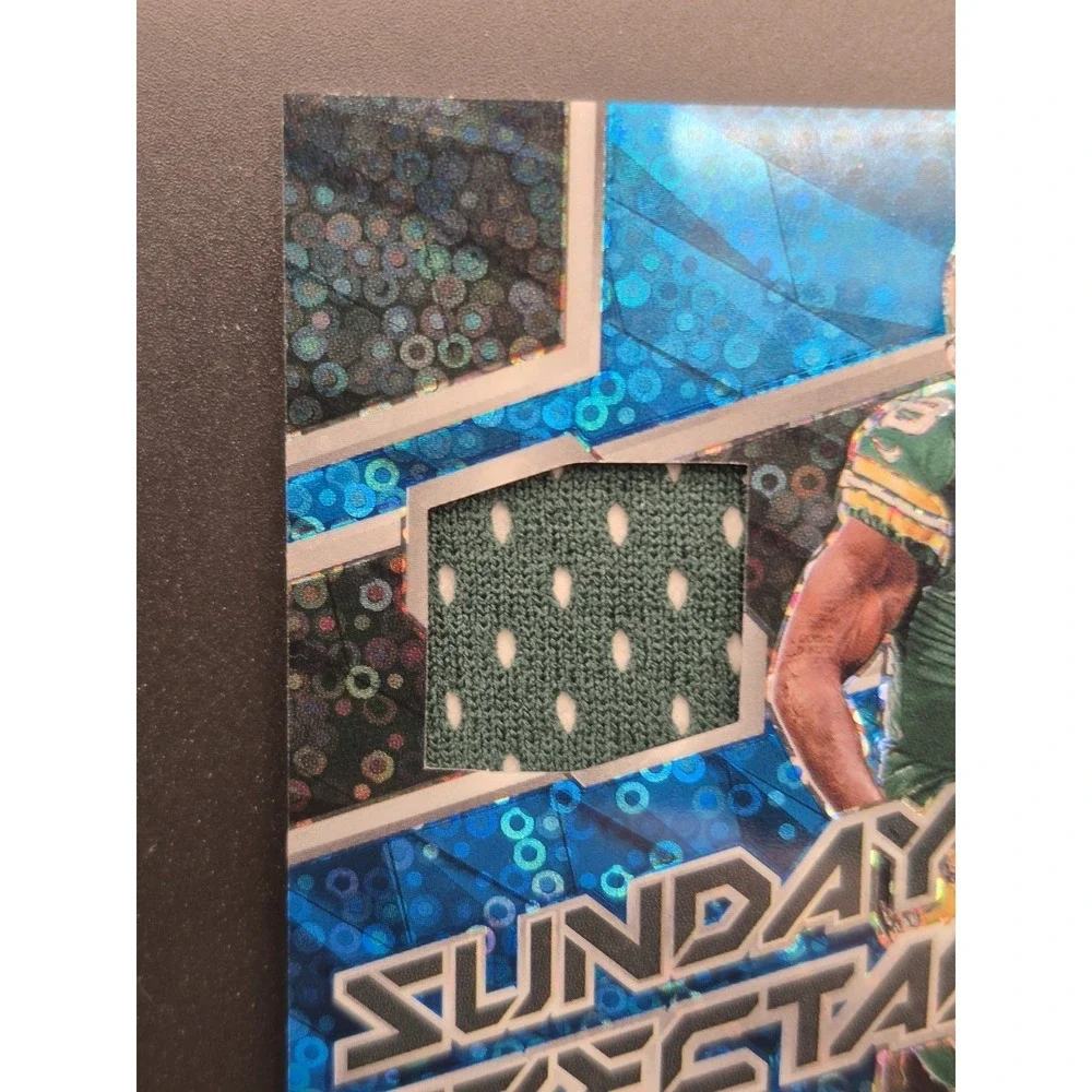 2024 Panini Spectra Sunday Spectacle Josh Jacobs #SS-JJS Neon Blue Prizm /60